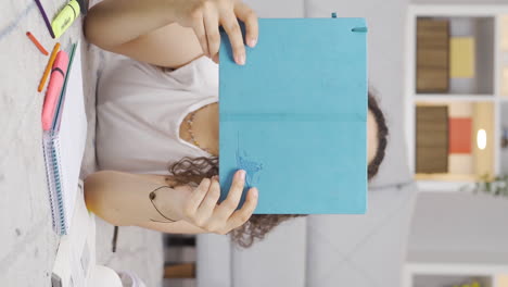 Vertical-video-of-Fun-and-cheerful-Female-student.